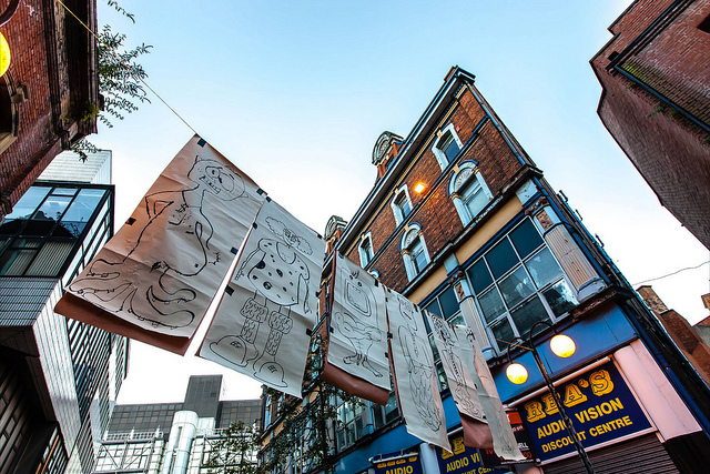 Artwork hanging in the street during Belfast Culture Night (Image by David Bunting, Images-NI, under Creative Commons)