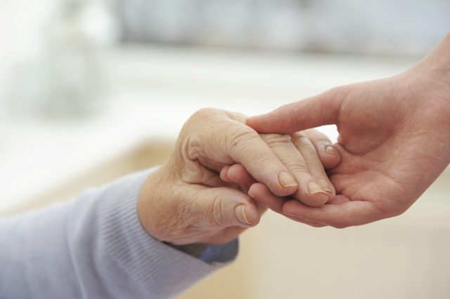 An image of two hands: there may be testing times ahead for the Third Sector