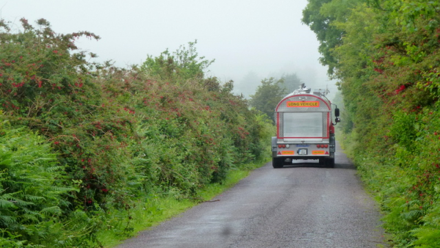Image of a milk tanker travelling down a country road (image by Jonathan Billinger and licensed for reuse under Creative Commons)