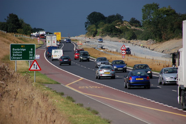 A look back at the dualling of the A1; the main route between Belfast-Newry-Dublin. The new north-bound carriageway is on the left and carrying two-way traffic while the new south-bound carriageway is under construction on the right. The road opened on 23 November 2006.