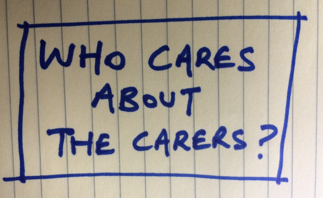 A written notes with the words 'Who cares about the carers?'