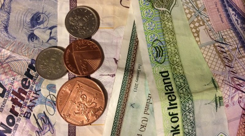 An image showing some Northern Ireland bank notes and coins