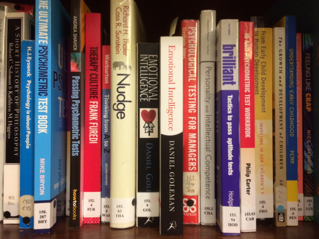 A photograph showing a selection of titles from the Assembly Library's Class 100 titles; in the Dewey Decimal system, 100 is used to classify philosophy and psychology