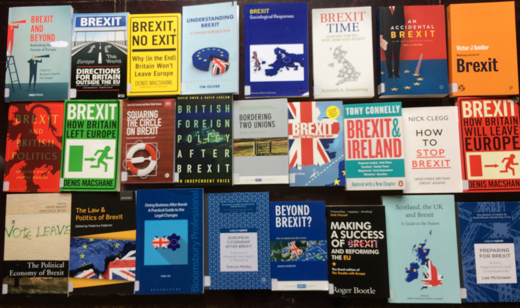 A photograph of some books showing part of the growing collection of Brexit-related publications in the Assembly Library