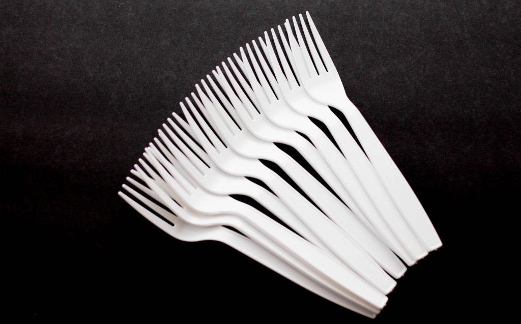 An image showing a set of disposable plastic forks