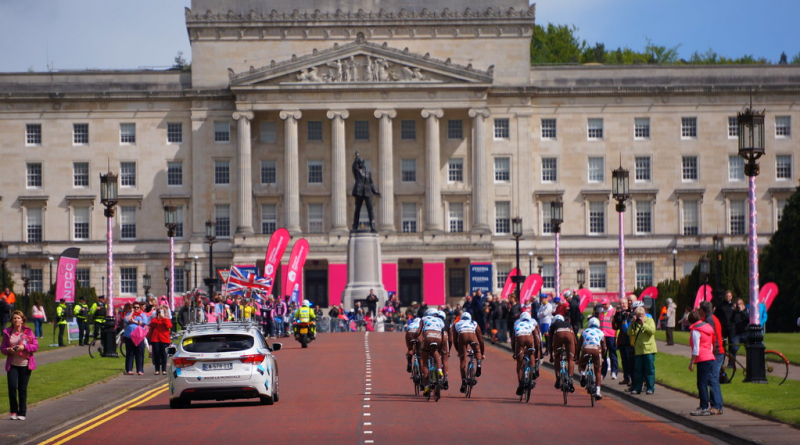 An image showing the start of the Giro d'Italia bike race with Parliament Buildings, Stormont in the background