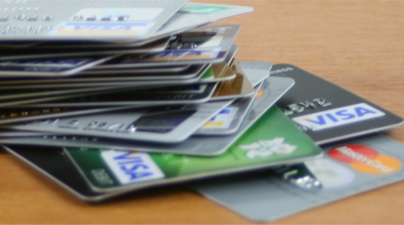 An image of a pile of credit or debit cards