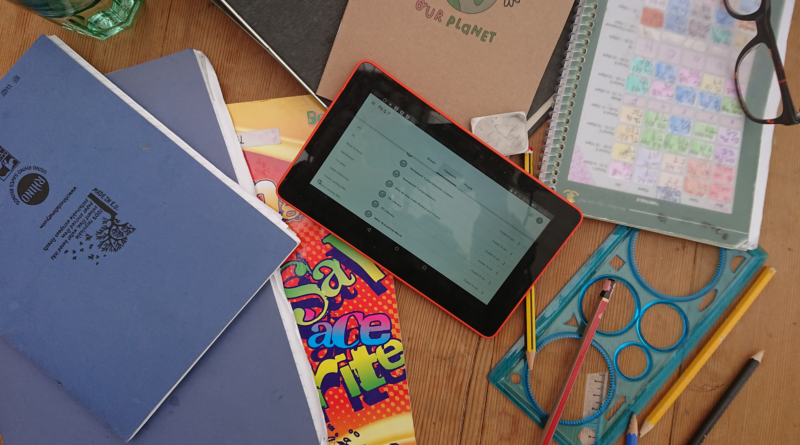 An image showing some school books and other material as part of home-schooling