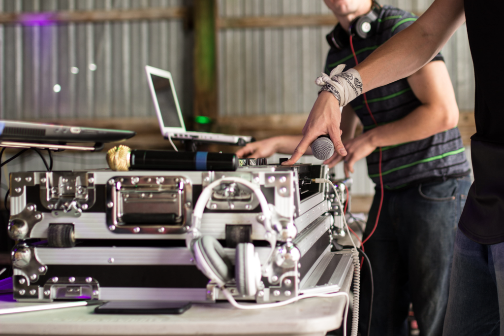 A photo showing two DJs at work