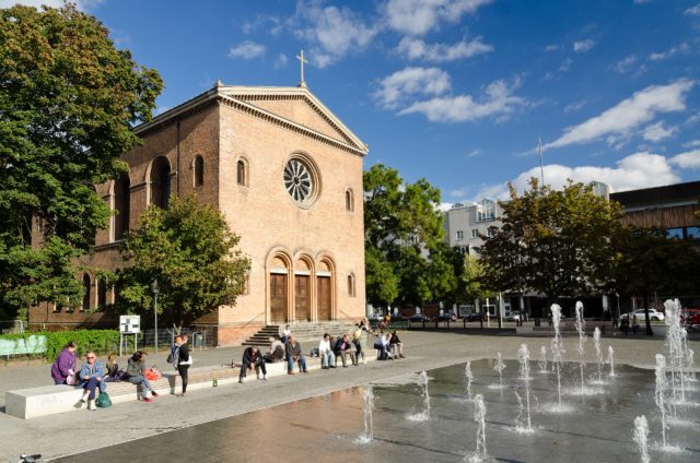 The Nazareth Church on Berlin-Wedding’s Leopold Square with new seating area and ornamental fountains
