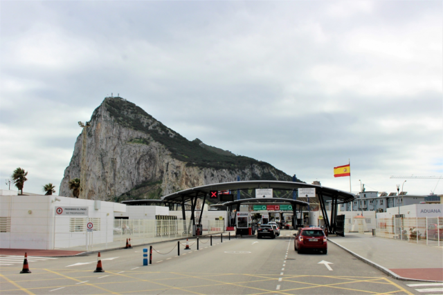 An image showing the border control entrance to Gibraltar from La Línea in Spain (image by Guy Percival, from Public Domain Picture)