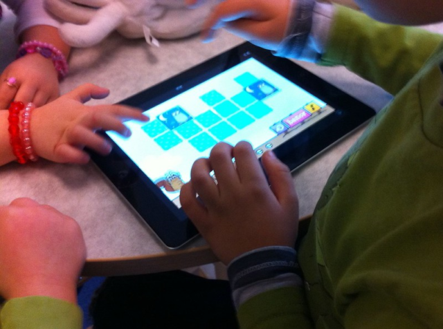 An image showing a game being played on a tablet device.