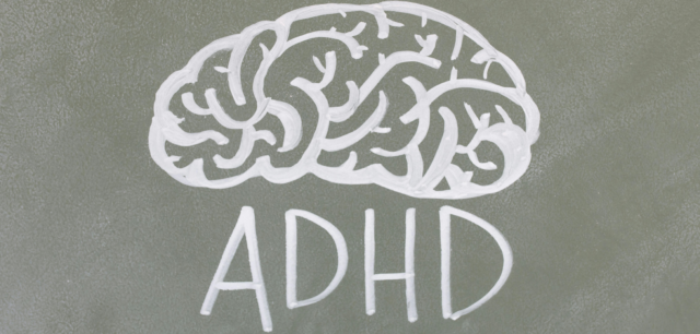 AN image showing a chalk drawing of a brain with the word 'ADHD' underneath it.
