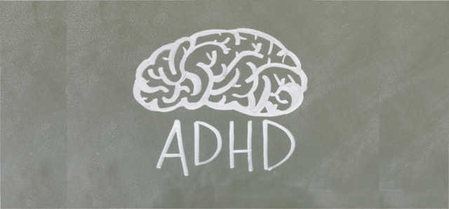 An image showing a chalk drawing of a brain with the word 'ADHD' underneath it