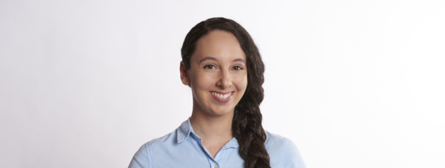 A stock image of a person looking happy